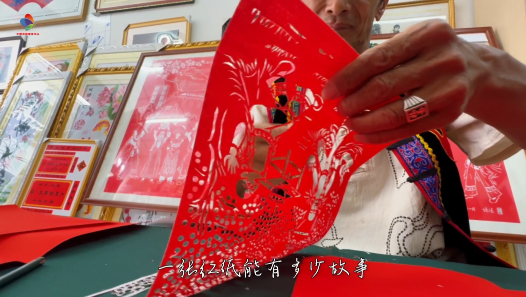 非遗巧剪凝彝韵 
